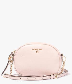 Jet set oval camera crossbody in soft pink